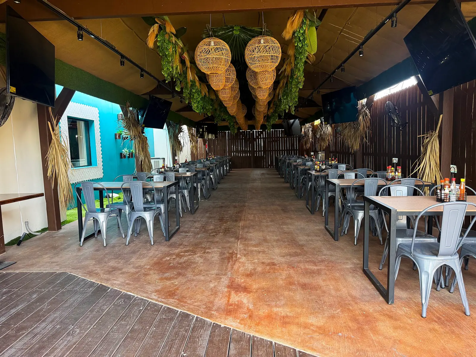 The palapa event hall with rattan globe lights